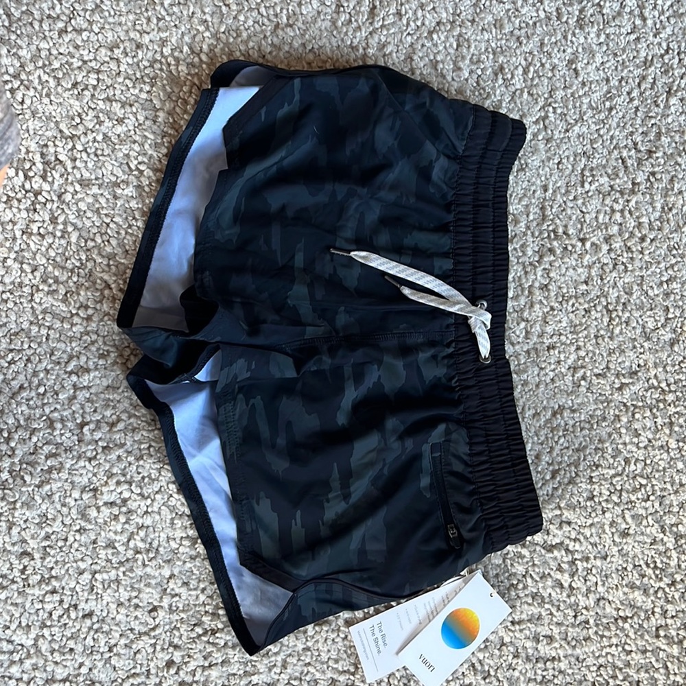 I bought these Vuori shorts and they have never been worn. New with tags.